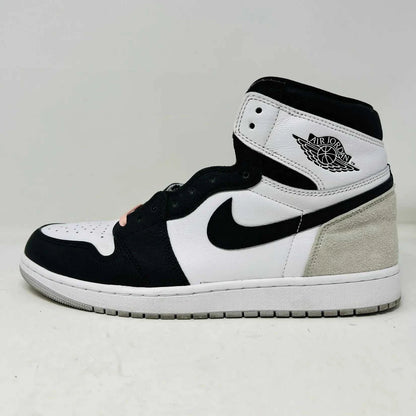 Jordan 1 Retro High OG Bleached Coral sneaker, black and white design, side view.