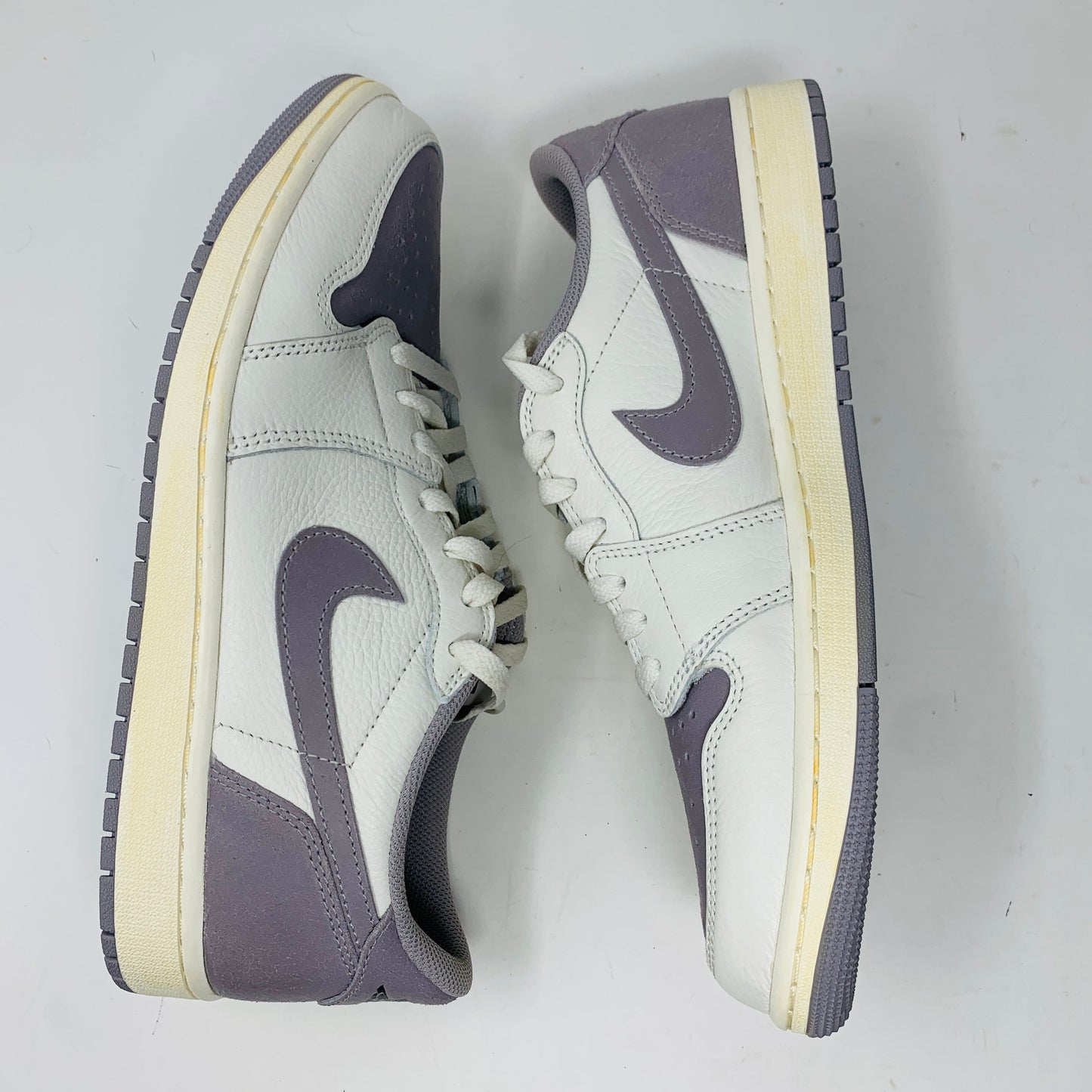 Jordan 1 Retro Low OG Atmosphere Grey sneakers size 11, 2023 release, excellent condition.