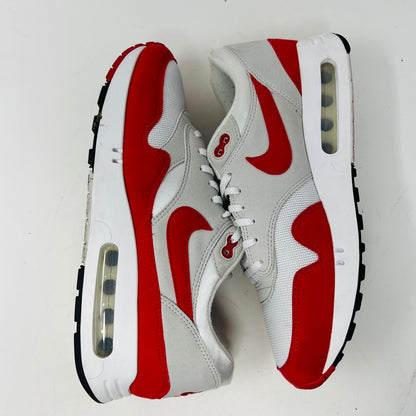 Authentic Nike Air Max 1 86 OG Big Bubble Sport Red sneakers, size 10.5, feature a white mesh upper with red accents and the iconic Nike logo on the tongue and side. In good condition with white laces and a red-and-white sole. Viewed from above.