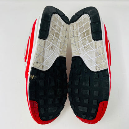 Authentic Nike Air Max 1 86 OG Big Bubble Sport Red sneakers, size 10.5, feature a white mesh upper with red accents and the iconic Nike logo on the tongue and side. In good condition with white laces and a red-and-white sole. Viewed from above.