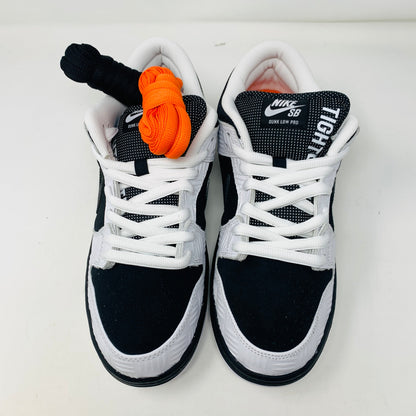 Nike SB Dunk Low TIGHTBOOTH sneakers with orange and black laces, brand new condition.