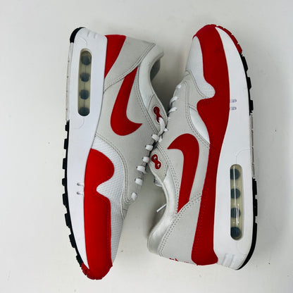 Authentic Nike Air Max 1 86 OG Big Bubble Sport Red sneakers, size 10.5, feature a white mesh upper with red accents and the iconic Nike logo on the tongue and side. In good condition with white laces and a red-and-white sole. Viewed from above.