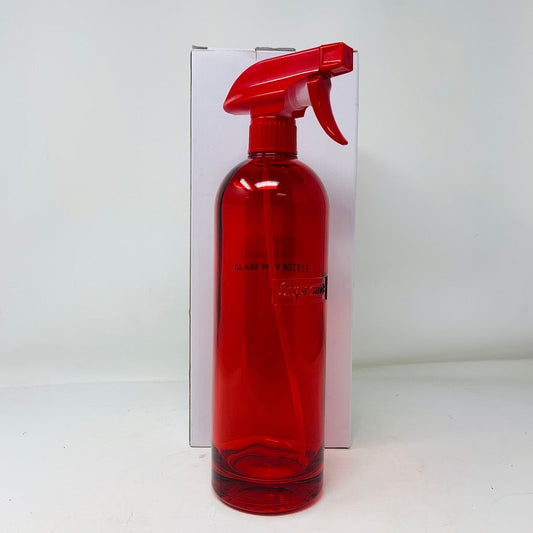 Red Supreme glass spray bottle with adjustable nozzle and ergonomic design.