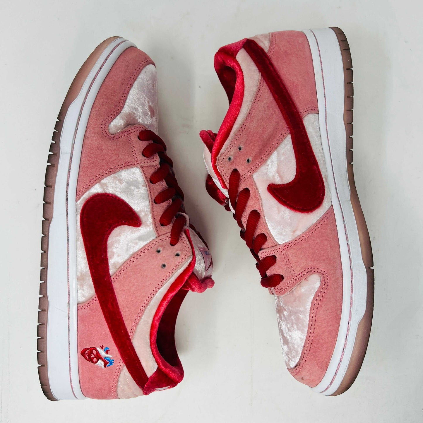 Nike SB Dunk Low StrangeLove Skateboards sneakers, size 9.5, 2020 release, pink and red colorway, with extra laces.