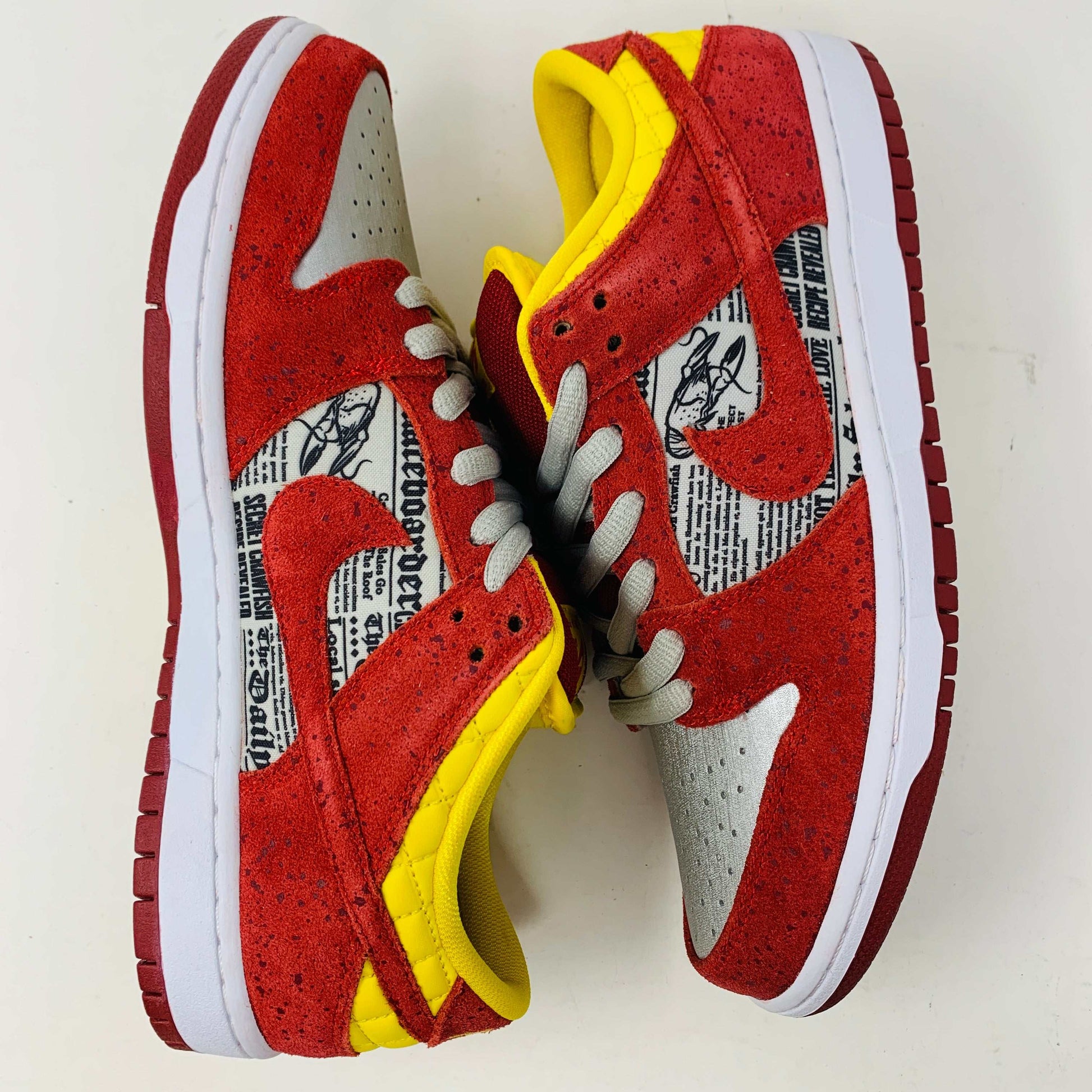 Nike SB Dunk Low Rukus Crawfish sneaker with red and orange textured upper, crawfish-inspired design.