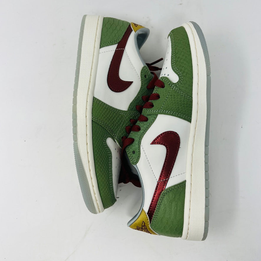 The Jordan 1 Retro Low OG Year of the Dragon (2024) by Jordan features a stylish green and white color scheme with a red swoosh and yellow accents, displayed side by side on a plain white background.