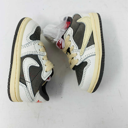 Jordan 1 Low TS Reverse Mocha TD toddler sneakers in reverse mocha colorway.