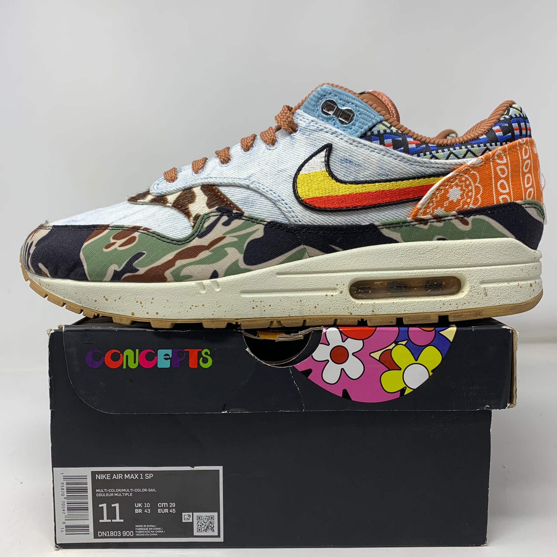 Nike Air Max 1 SP Concepts Heavy sneakers, size 11, 2022 model, featuring unique design and vibrant colors, displayed on box.