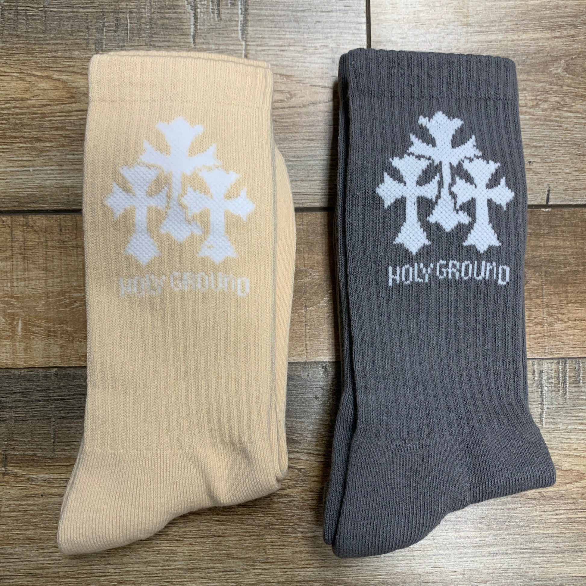 Holy Ground Socks in beige and gray, featuring cross design.