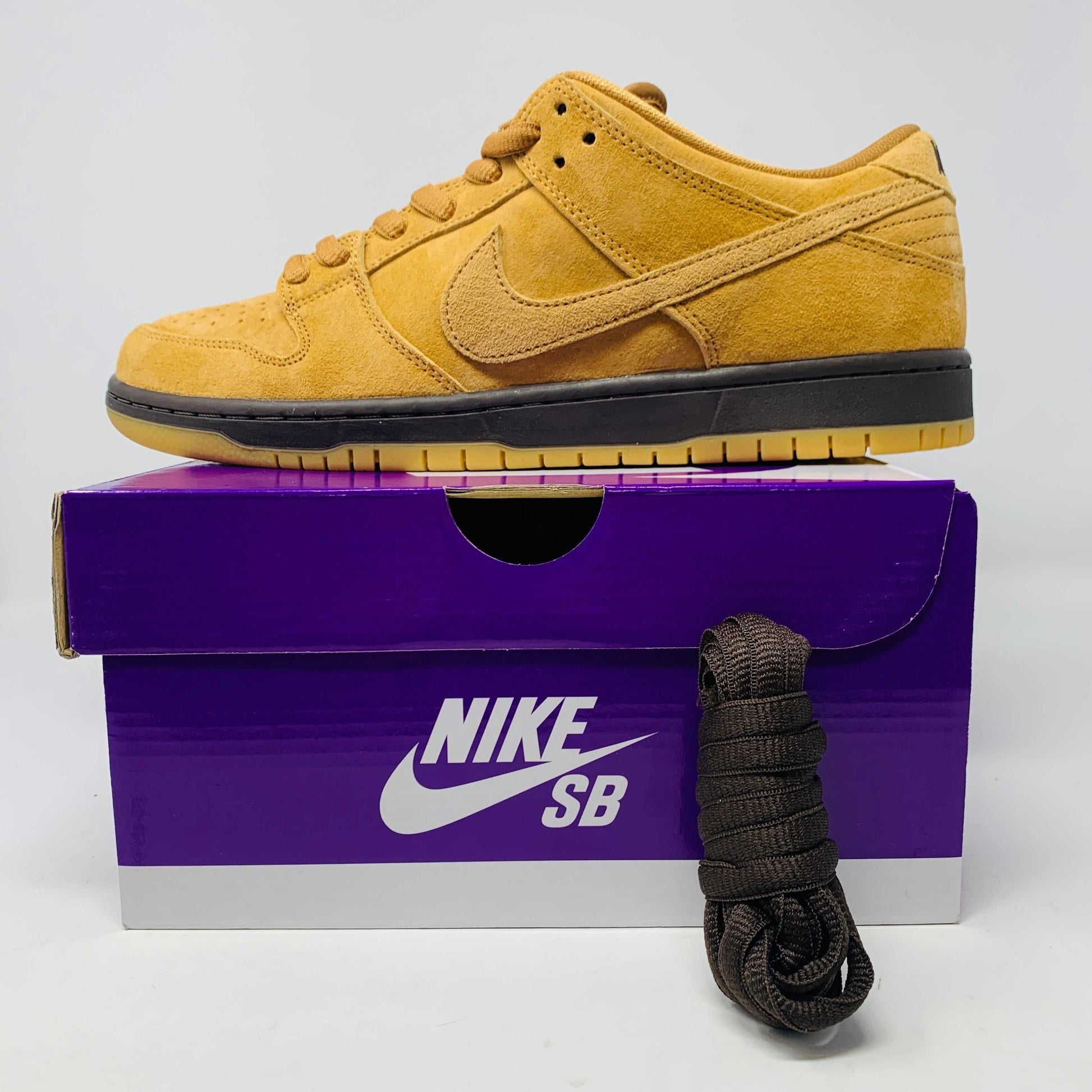 Nike SB Dunk Low Wheat 2021-2023 sneakers with wheat suede upper and white midsole.