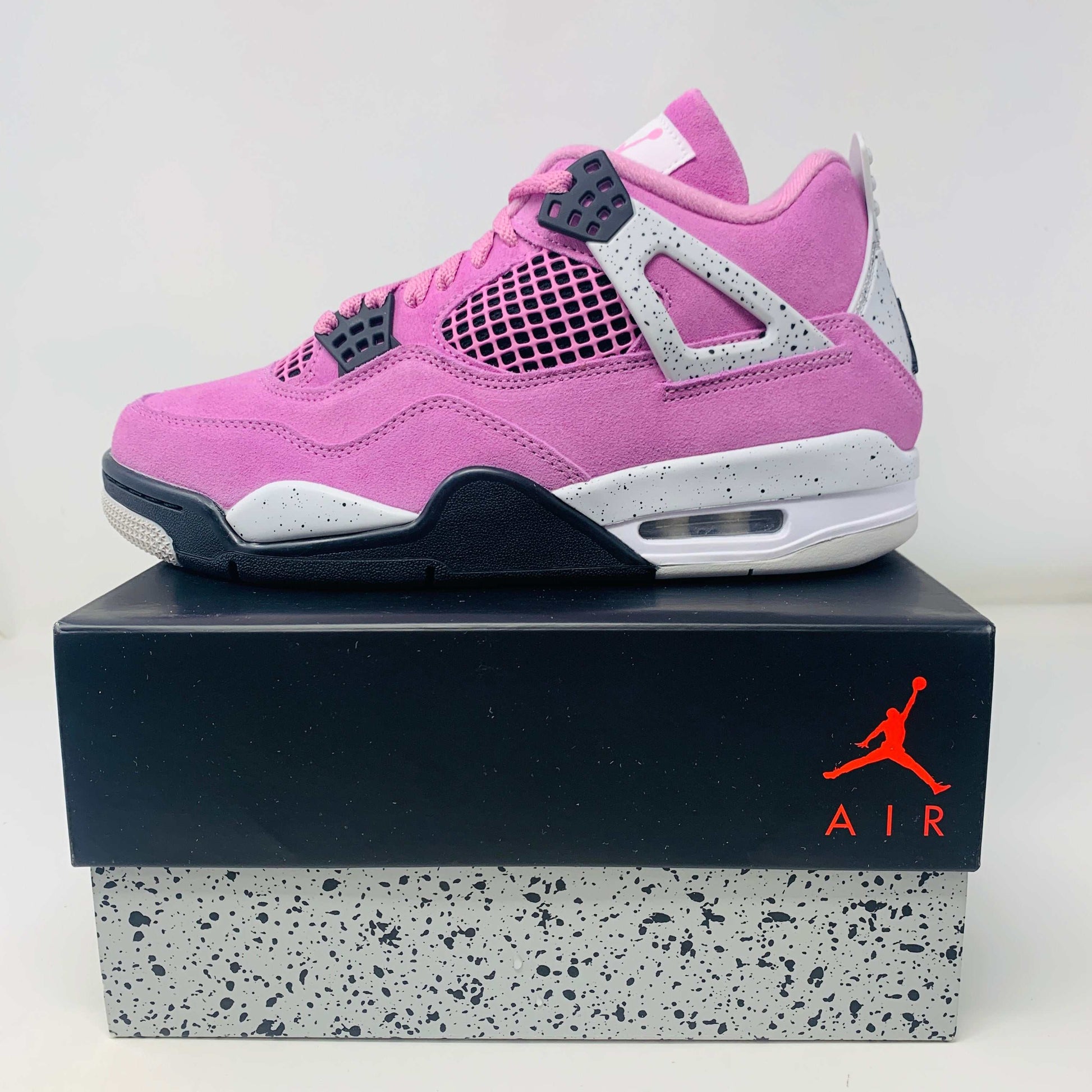 Jordan 4 Retro Orchid Women's sneaker, brand new, 2024 model, on original box.