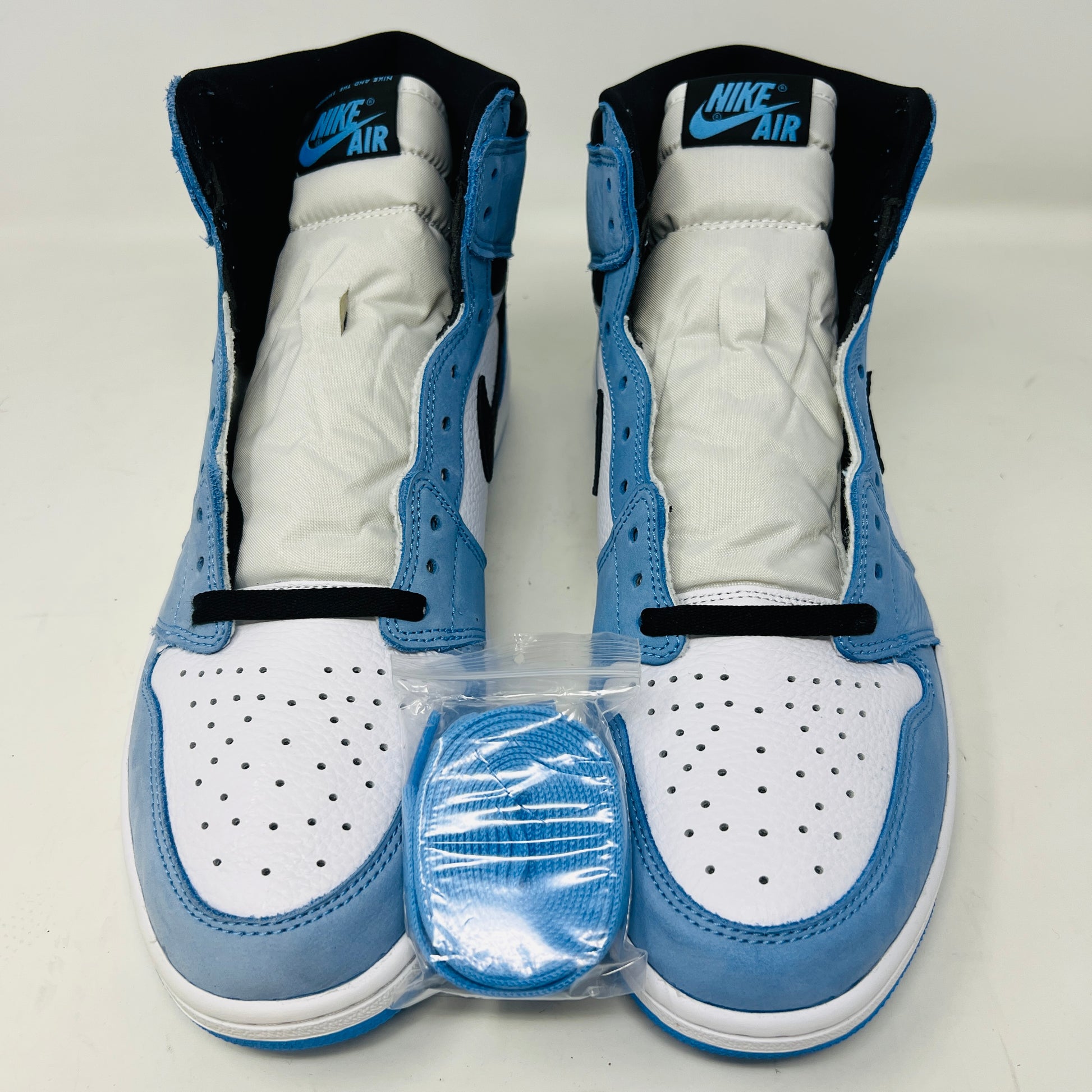 Jordan 1 Retro High OG University Blue sneakers, 9/10 condition, worn once, no box, 2021 release.