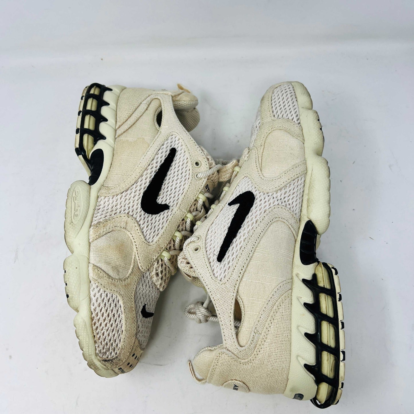 Nike Air Zoom Spiridon Cage 2 Stussy Fossil sneakers with slight heel drag, 2020 model, displayed on original box.