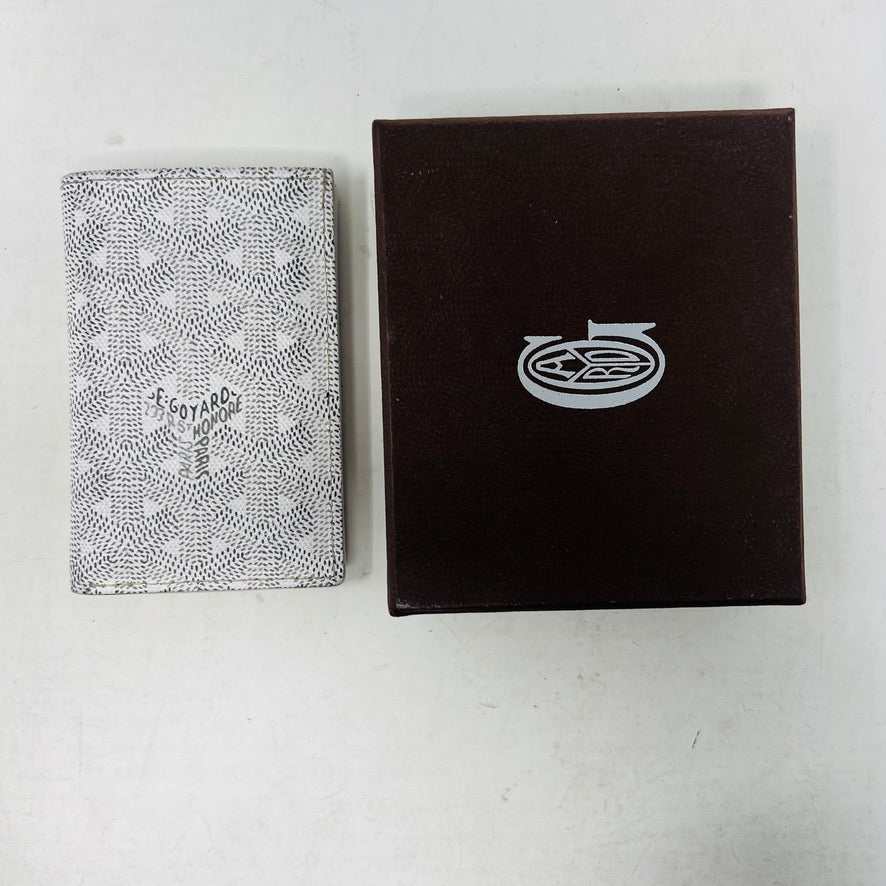 Goyard Saint Pierre Card Holder White with embossed logo and box.