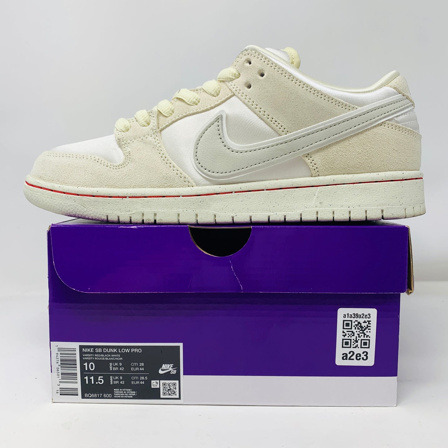 Nike SB Dunk Low City of Love Light Bone on purple shoe box, size 10, lightly worn.