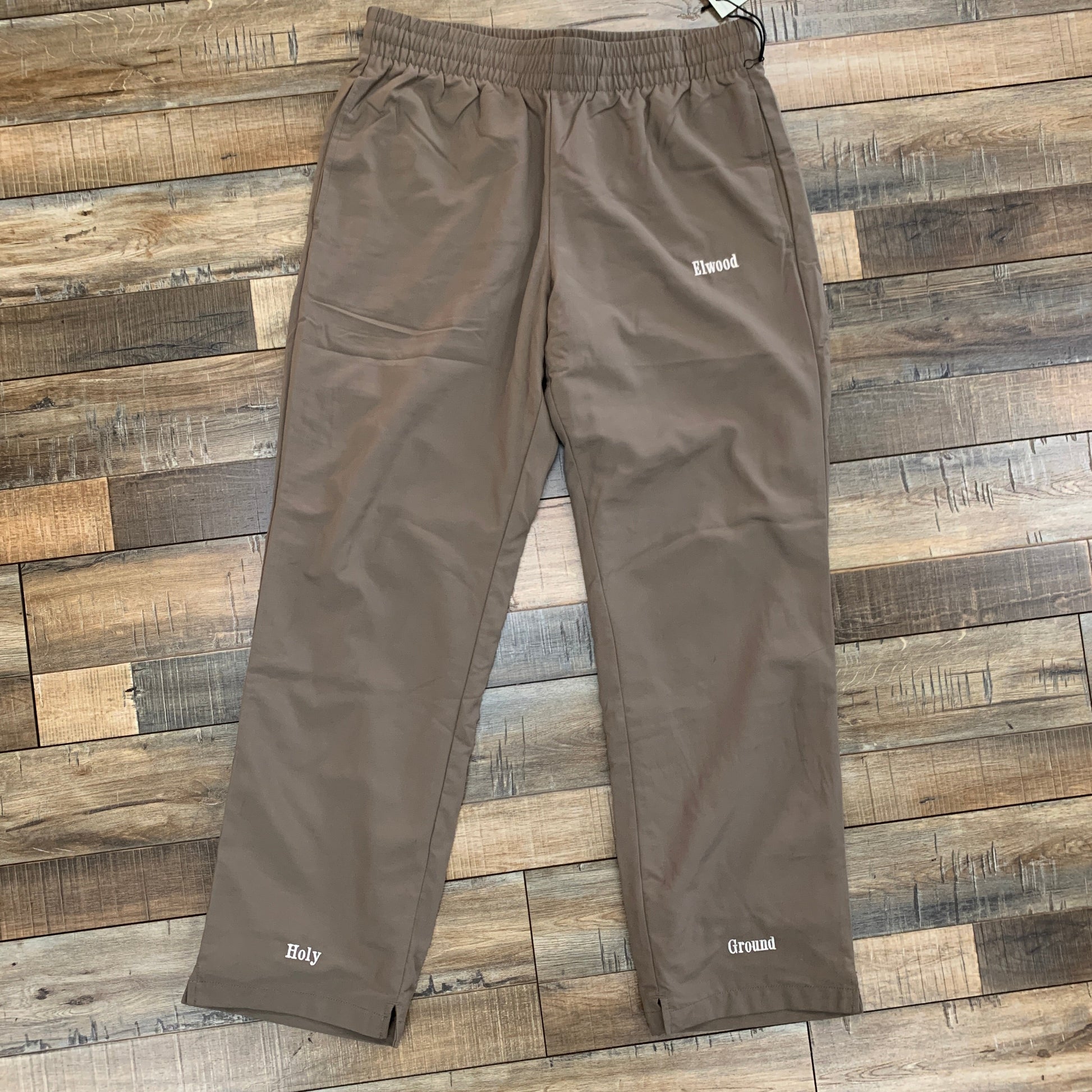 Holy Ground Pants in earthy brown with relaxed fit and elastic waistband for everyday style.