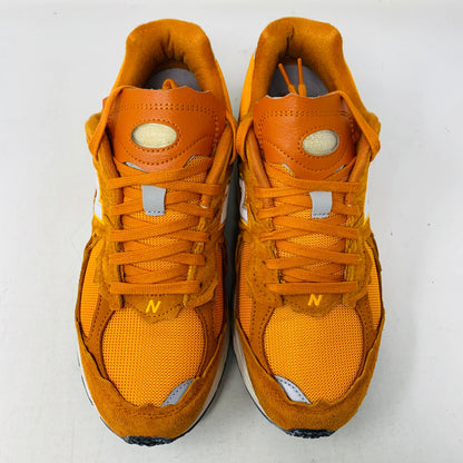 New Balance 2002R Protection Pack Vintage Orange sneakers, size 9.5M, lightly used, 2022 model.