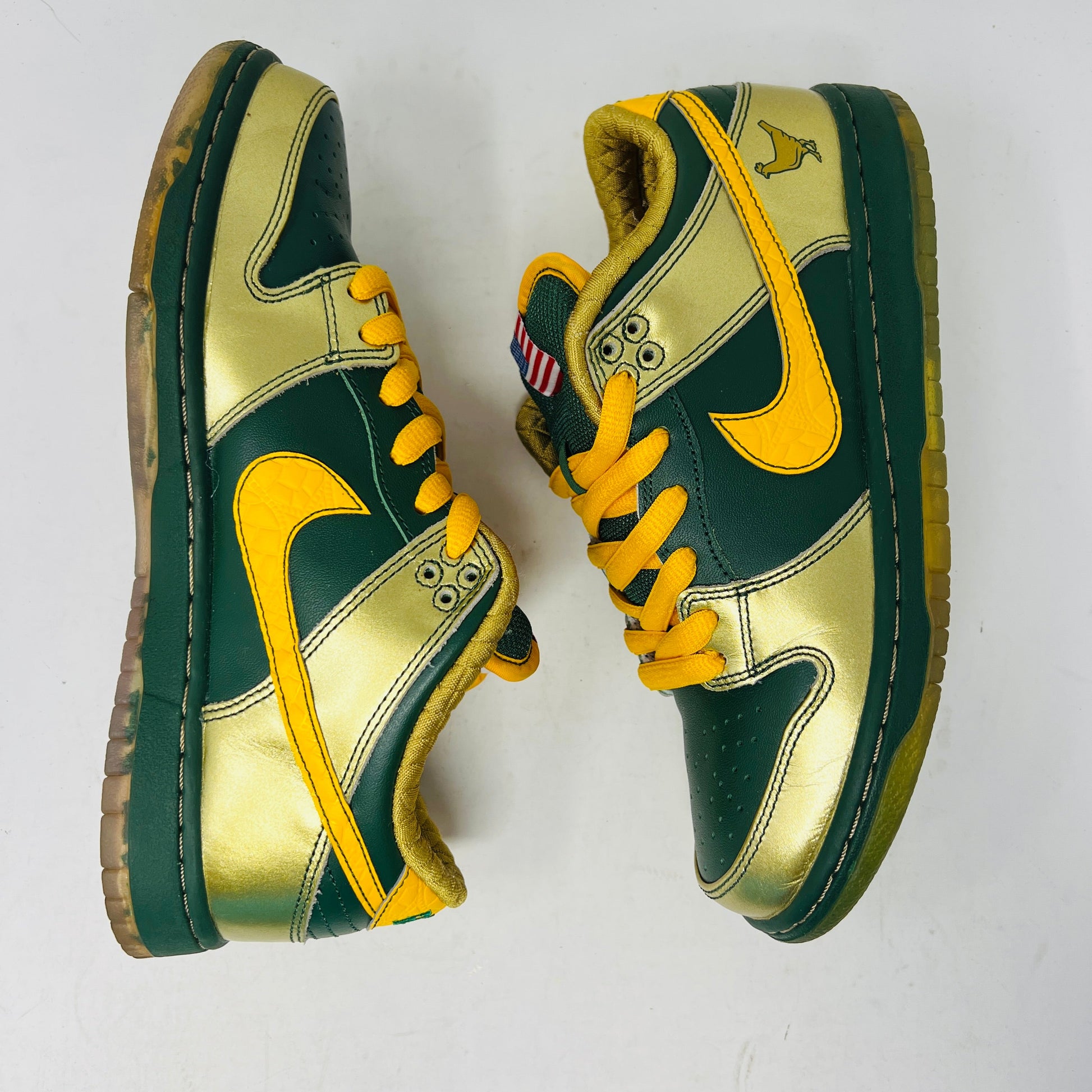 Nike SB Dunk Low Doernbecher 2018 sneakers, size 7M, green and gold colorway, condition 8.5/10, with extra laces.