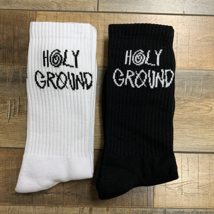 Holy Ground Socks in white and black, offering comfort and support for spiritual journeys.