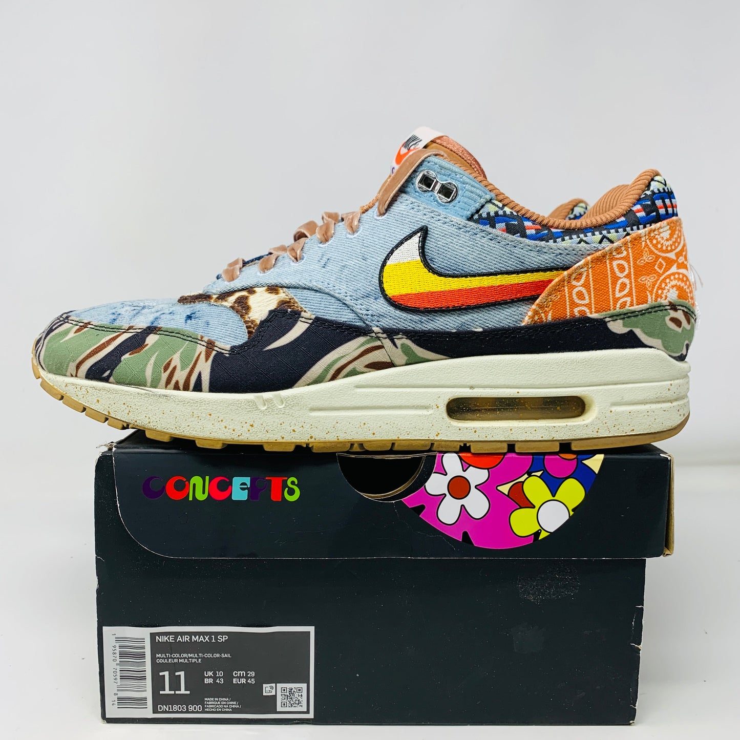 Nike Air Max 1 SP Concepts Heavy sneakers, size 11M, with vibrant multicolor uppers displayed on box, 2022 edition.