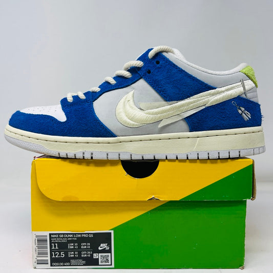 Nike SB Dunk Low Pro Fly Streetwear Gardenia sneakers, blue and white colorway, displayed on a shoebox.