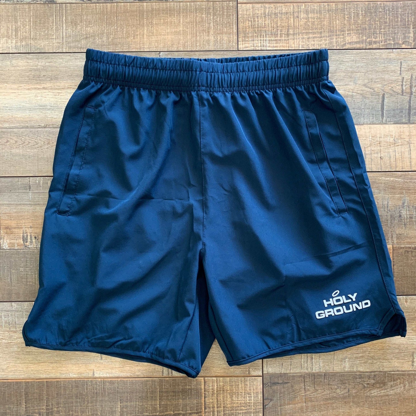 Holy Ground Athletic Shorts Blue with elastic waistband and logo embroidery.