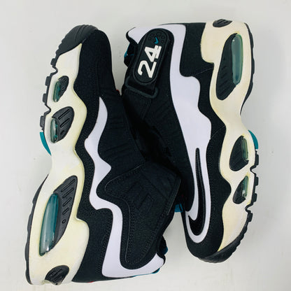 The Nike Air Griffey Max 1 White Freshwater (2016) shoes feature black and white tones with teal accents, the number 24 on the tongue, a yellowed midsole, visible air cushioning, and a swoosh logo. They are displayed against a plain white background.