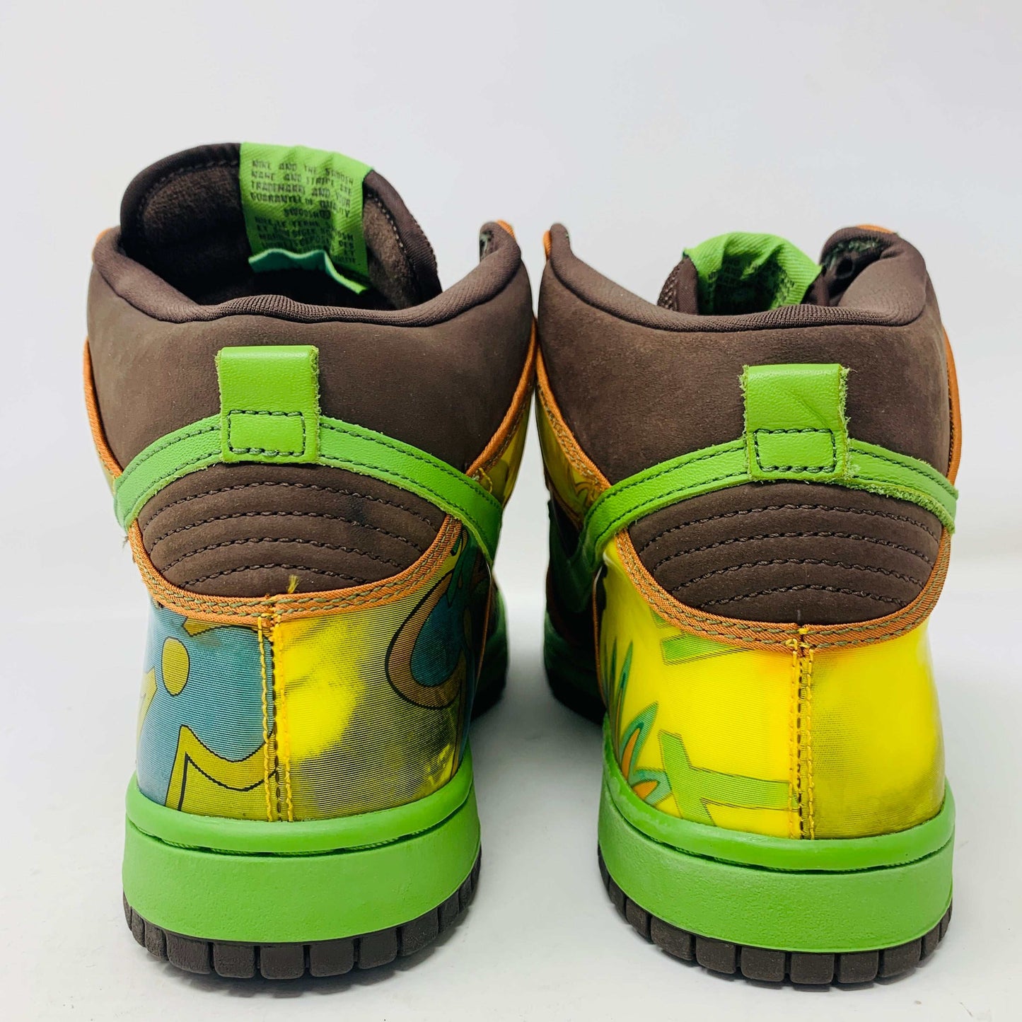 Nike SB Dunk High De La Soul 2005 sneakers with vibrant colors and patterns, rear view.