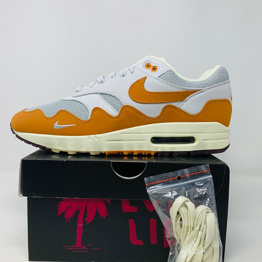 Nike Air Max 1 Patta Waves Monarch sneakers with extra laces and bracelet, 2021 model.