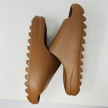 Yeezy Slide Flax in neutral colorway, lightweight and stylish design.