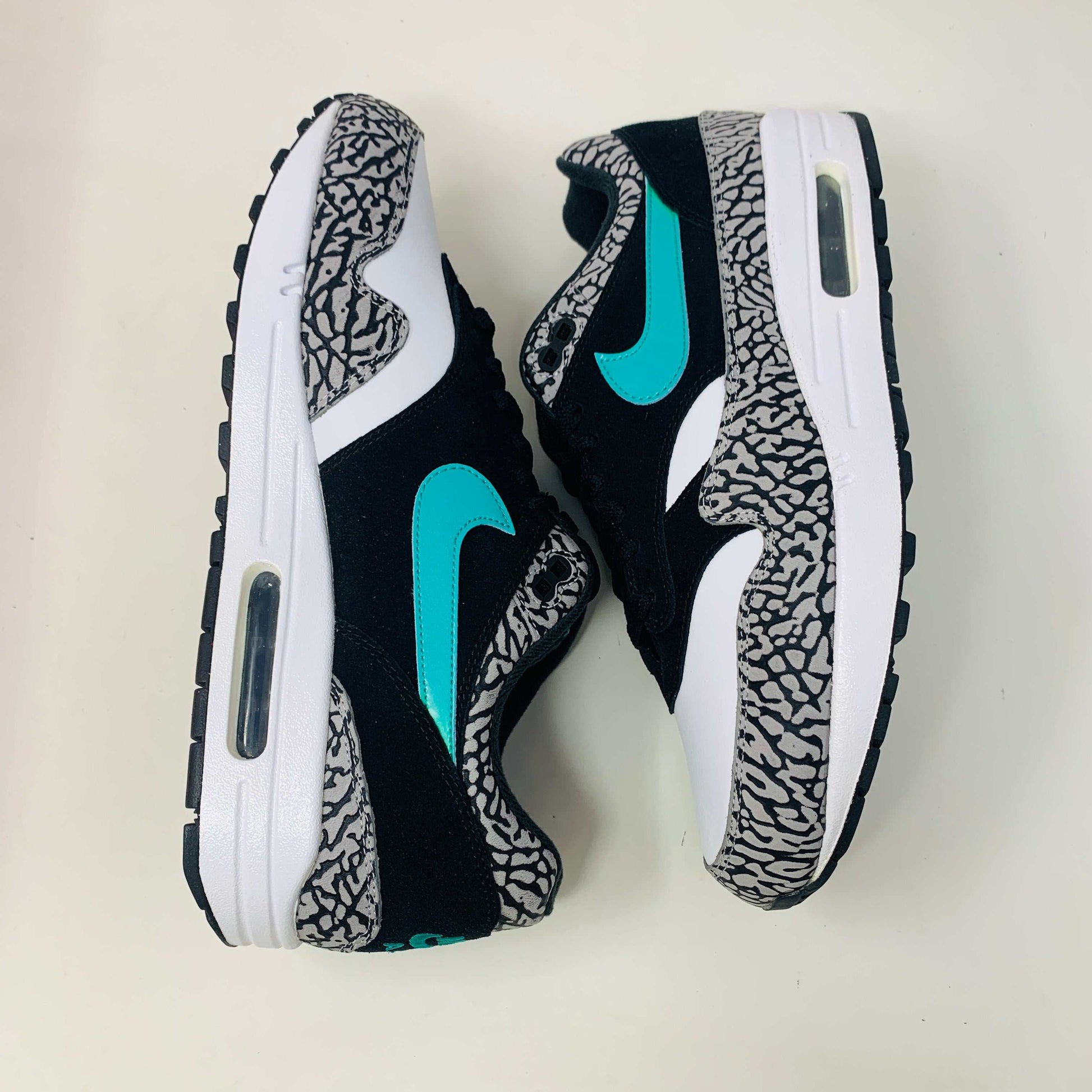 Nike Air Max 1 atmos Elephant 2017 sneaker with elephant print and teal swoosh.