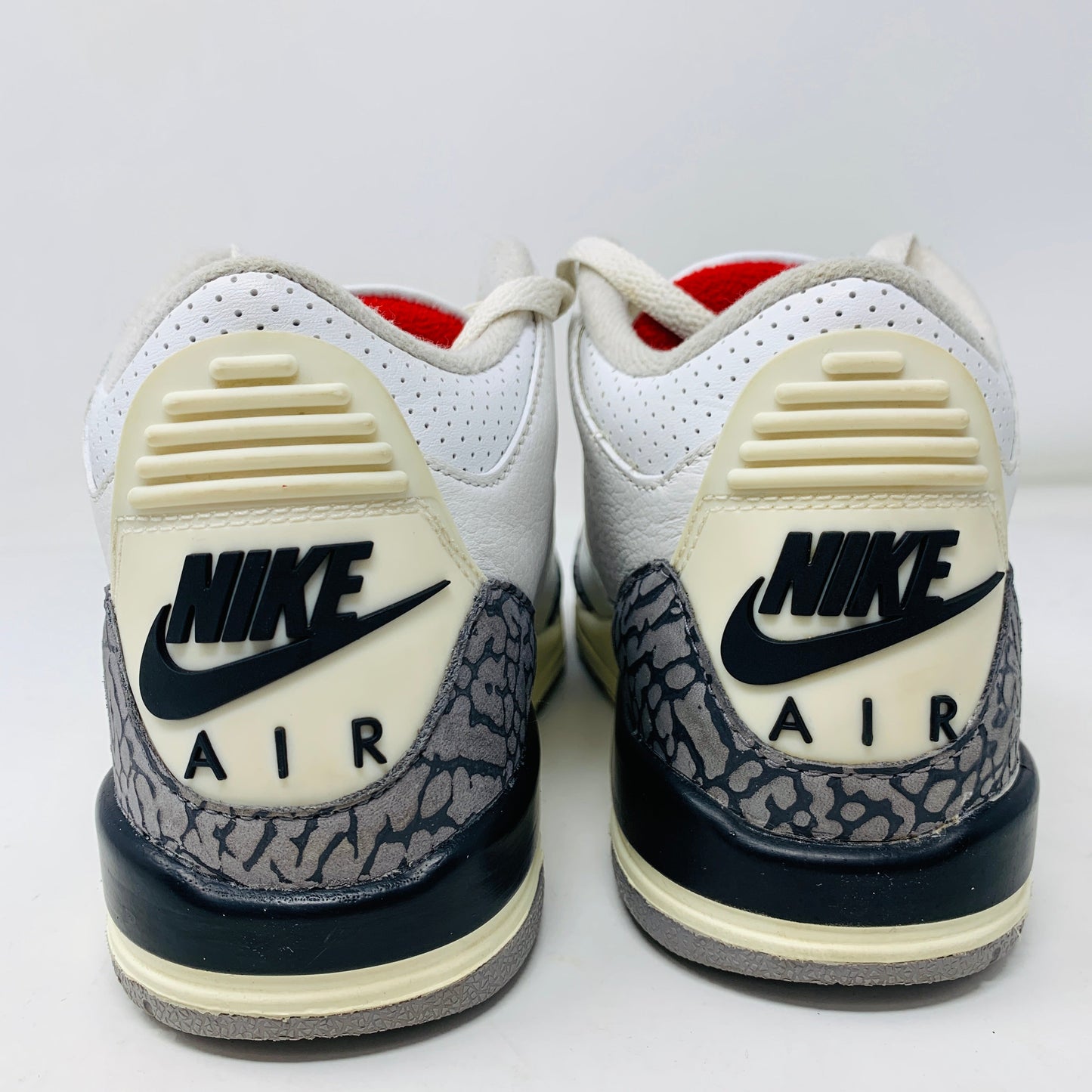 Jordan 3 Retro White Cement Reimagined GS sneakers, size 3.5Y, 2023, rear view showing Nike Air detail.