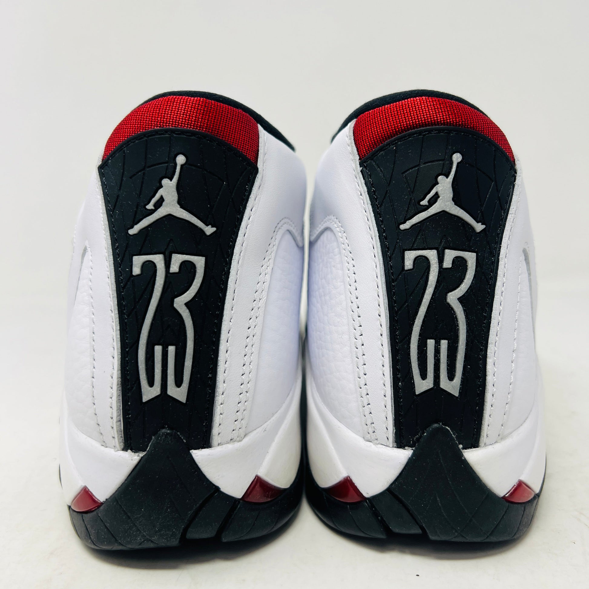 Jordan 14 Retro Black Toe 2024 GS sneakers, brand new condition, back view.