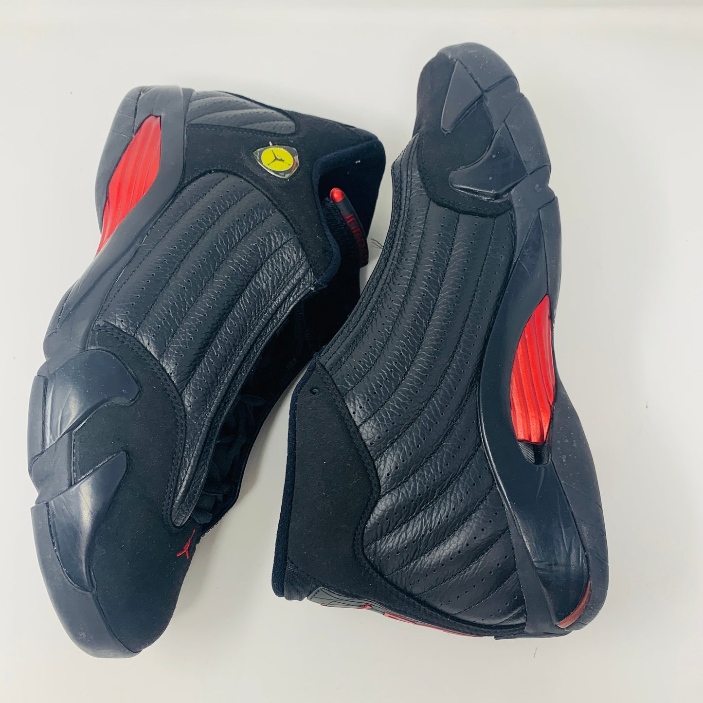 Jordan 14 Retro Last Shot 2011 sneakers, size 12, condition 8.5/10, black and red design.