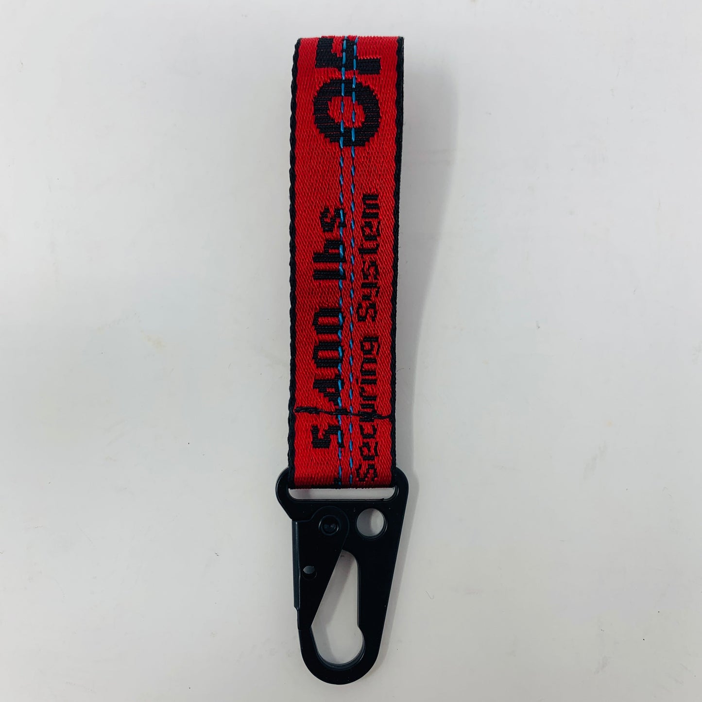 Custom-made Off White red keychain with authentic materials.