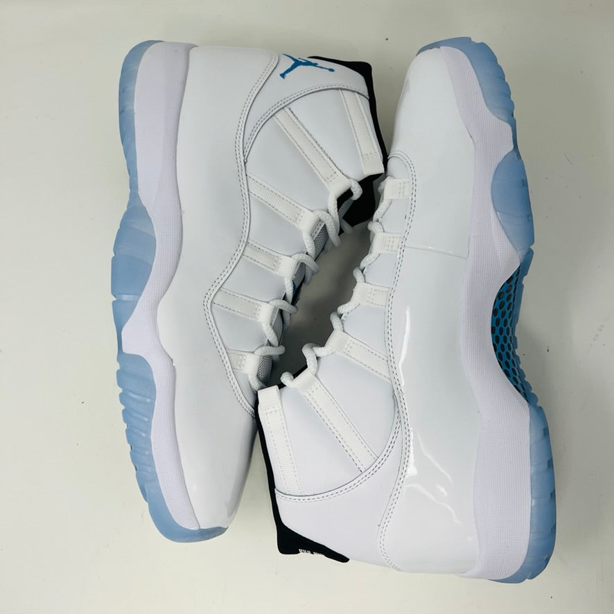 Jordan 11 Retro Legend Blue (2024) sneakers with white upper and light blue soles.