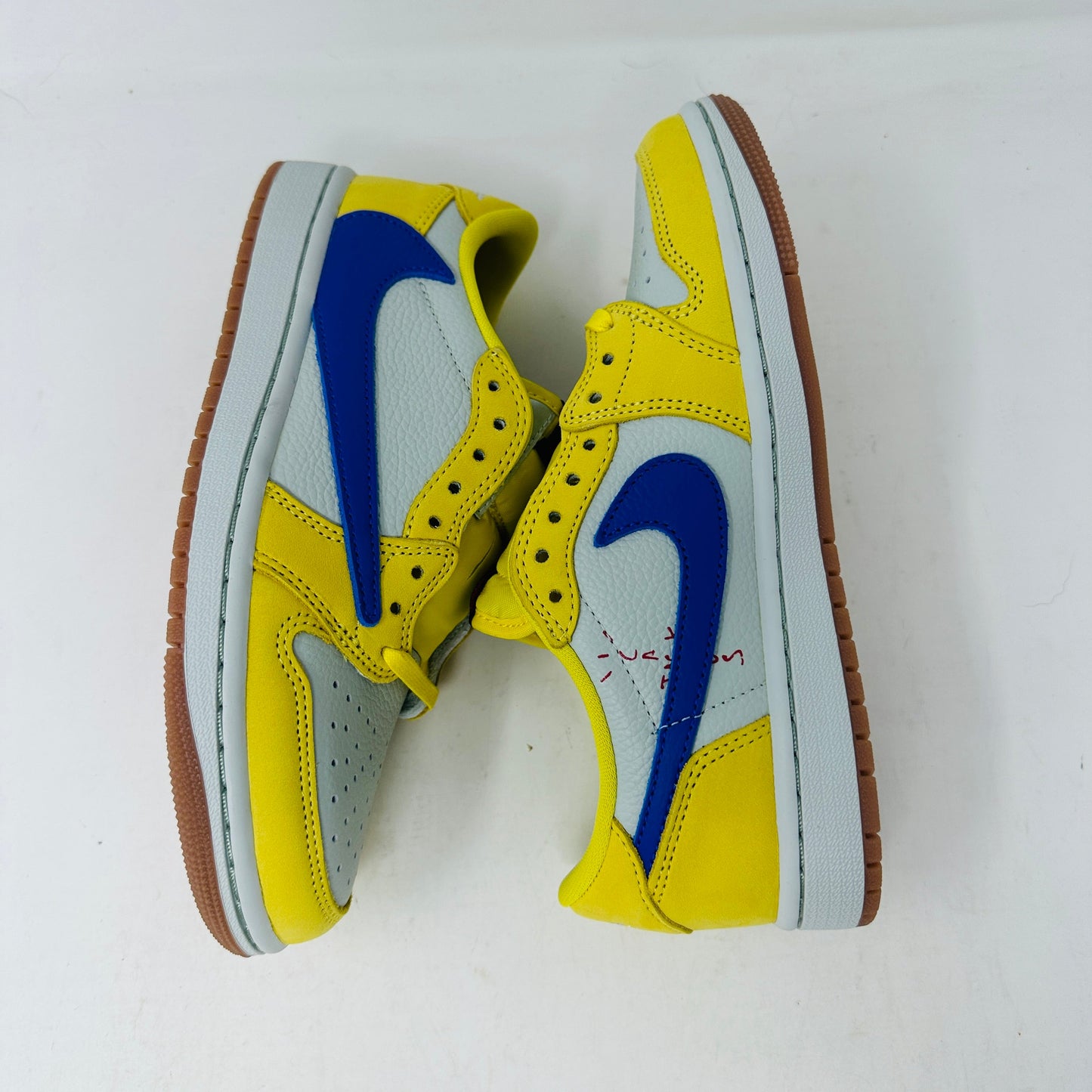 Jordan 1 Retro Low OG SP Travis Scott Canary women's sneakers, brand new with extra laces, yellow and blue colorway, 2024 release.