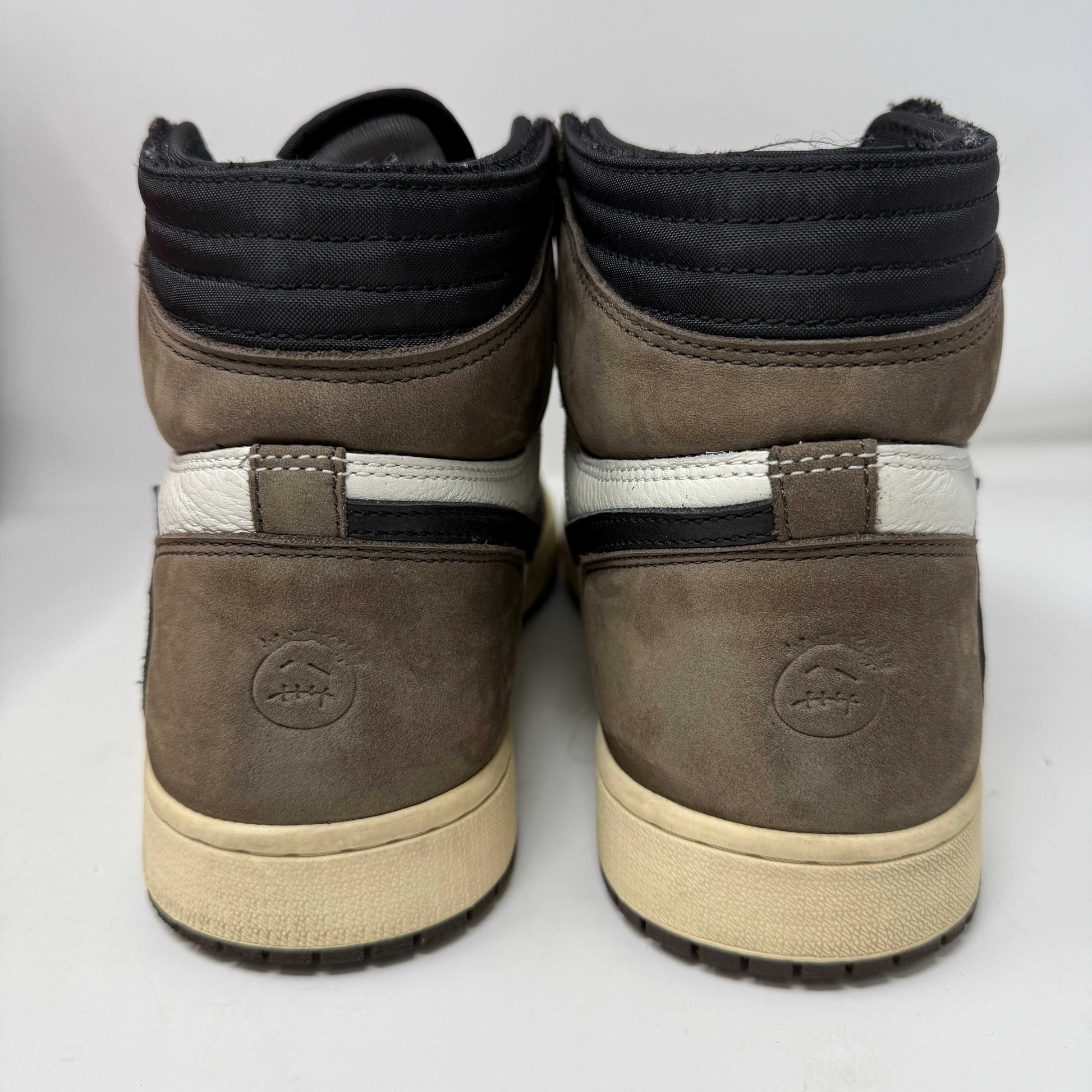 Jordan 1 Retro High OG SP Travis Scott Mocha sneakers, showing mocha brown colorway and high-top design for style and comfort.