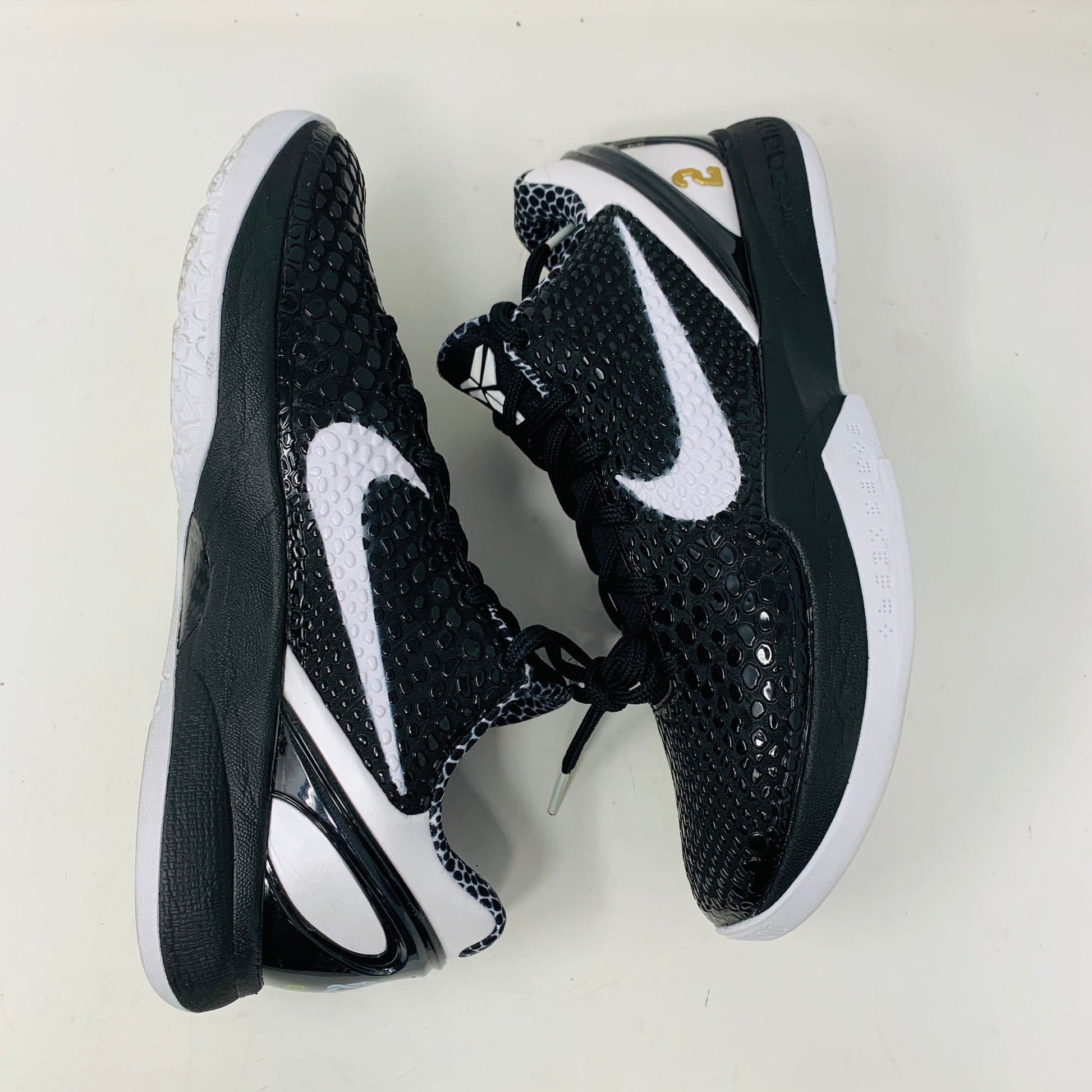 Nike Kobe 6 Protro Mambacita Sweet 16 sneakers in black with white accents, extra laces included, 2022 model.