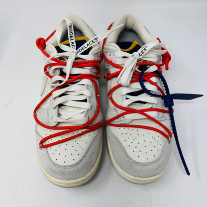 Nike Dunk Low Off-White Lot 13 sneakers with red laces and Off-White branding.