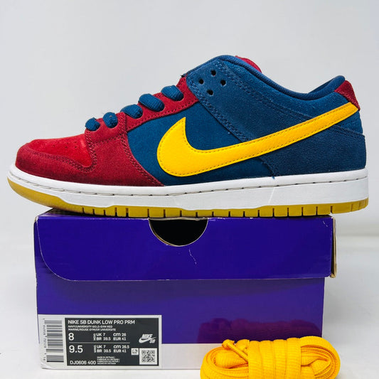 Nike SB Dunk Low Barcelona sneakers with colorful design, extra laces, and original box.