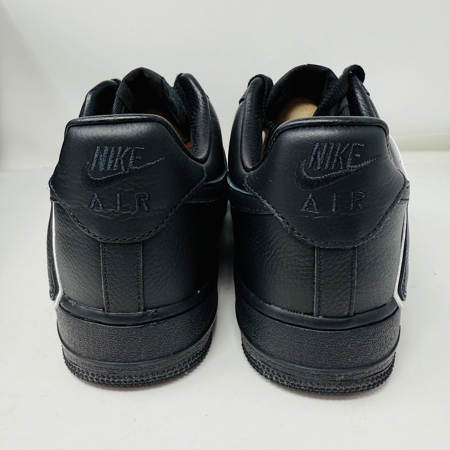 Nike Air Force 1 Low Cactus Plant Flea Market Black 2024 rear view showing black design and branding.