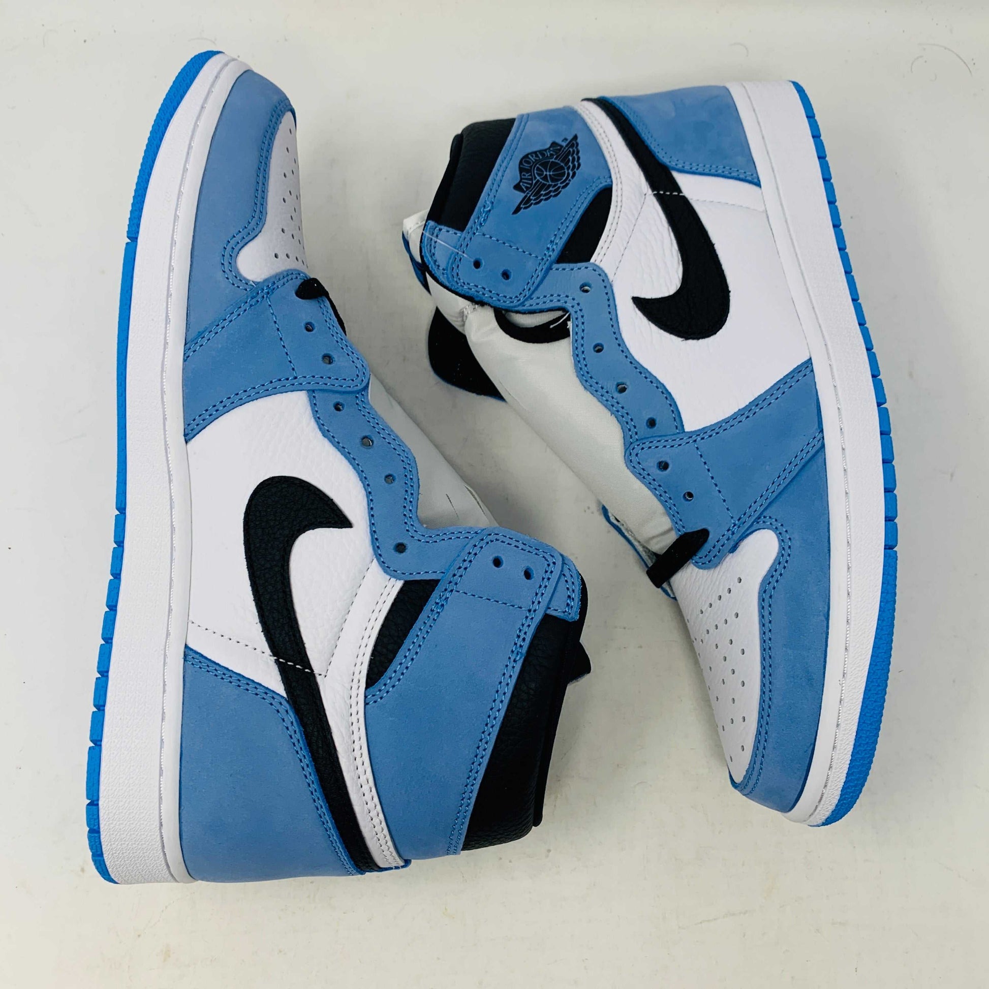 Jordan 1 University Blue sneakers, brand new with extra blue laces.