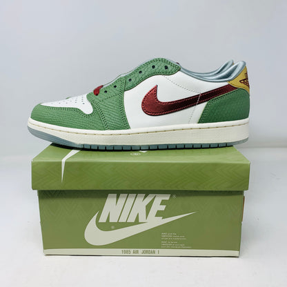 Jordan 1 Low Year Of The Dragon 2024 sneakers, green and white with red accents, displayed on a Nike box.