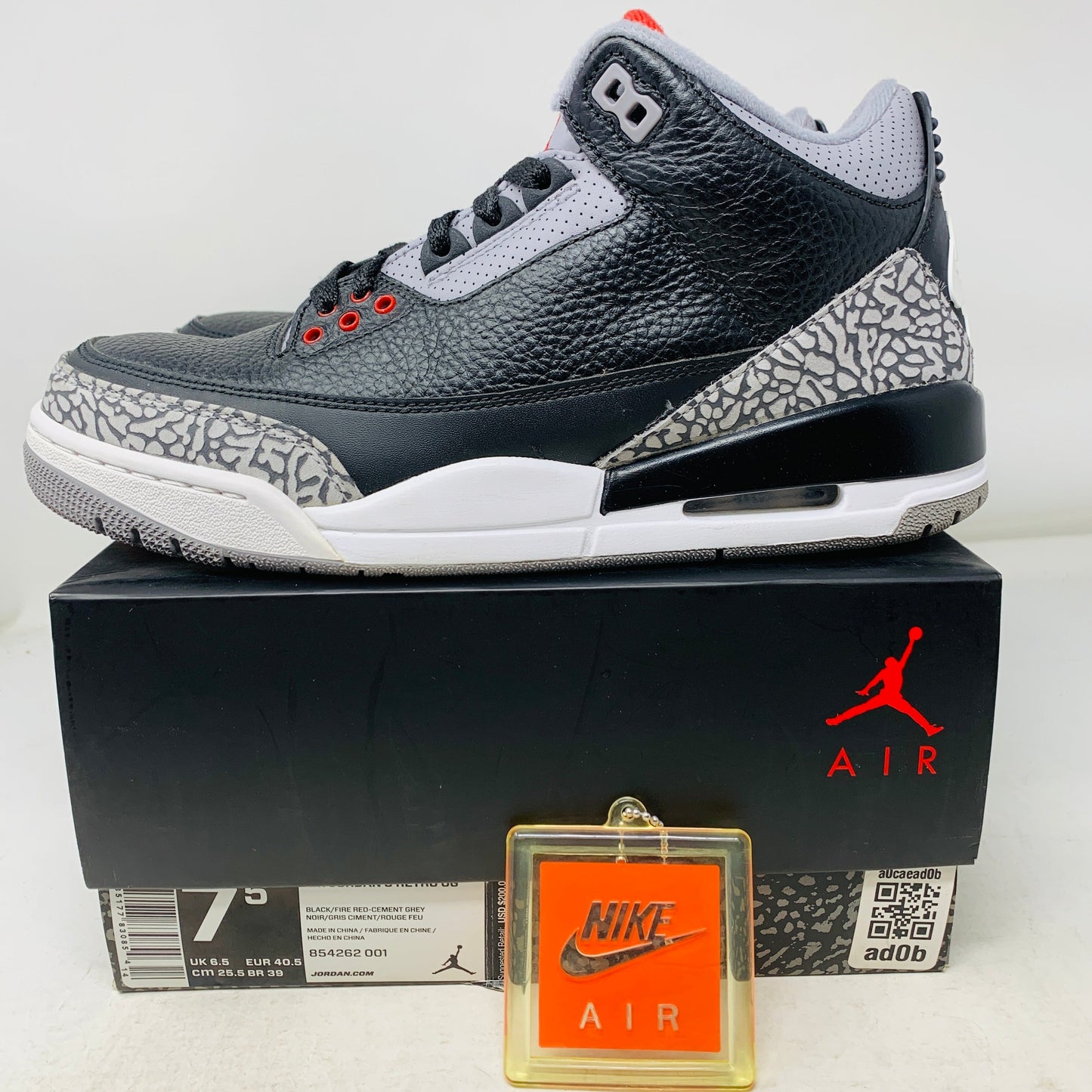 Jordan 3 Retro Black Cement 2018 sneakers with hang tag and original box.