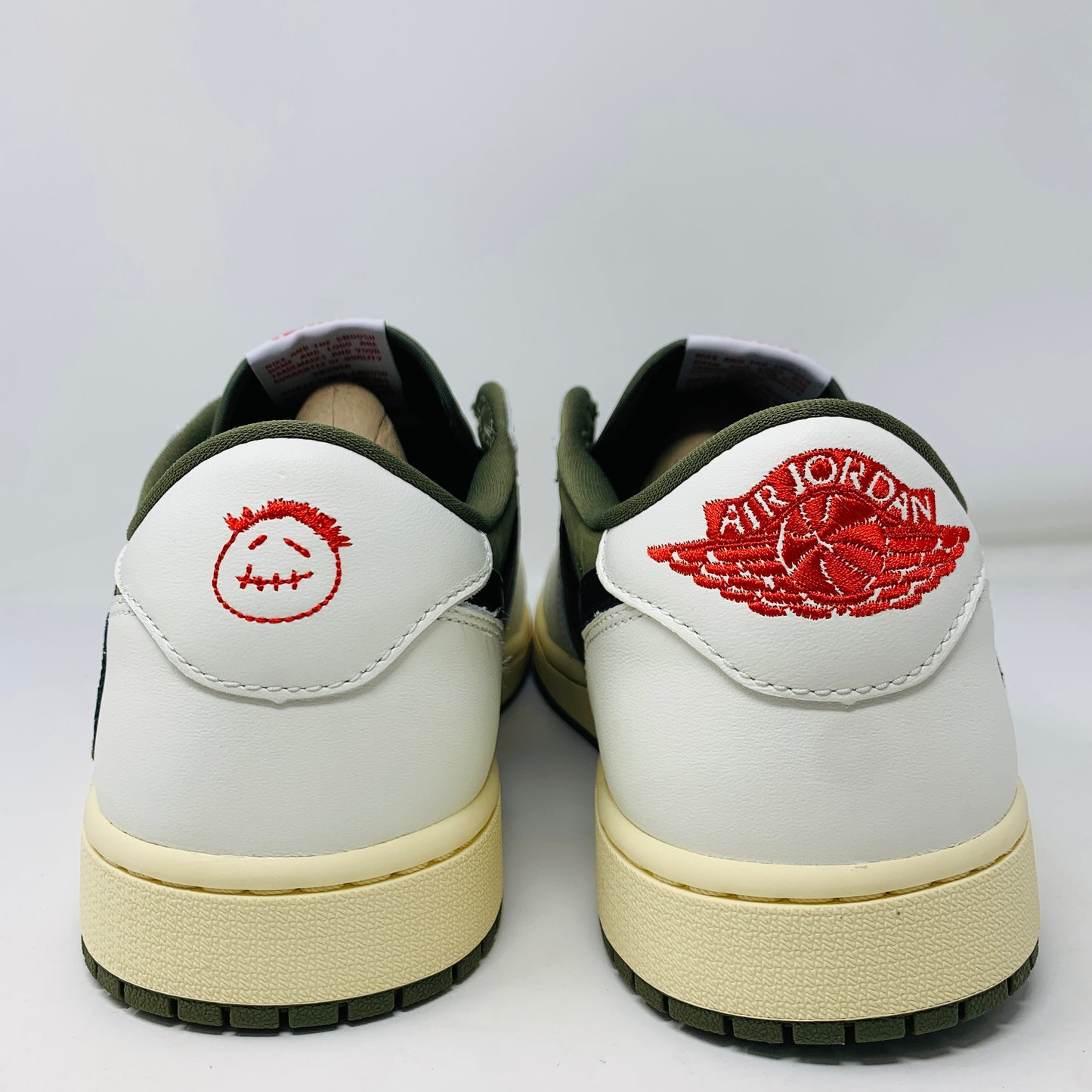 Jordan 1 Retro Low OG SP Travis Scott Medium Olive sneakers, back view, brand new condition, 2024 release.