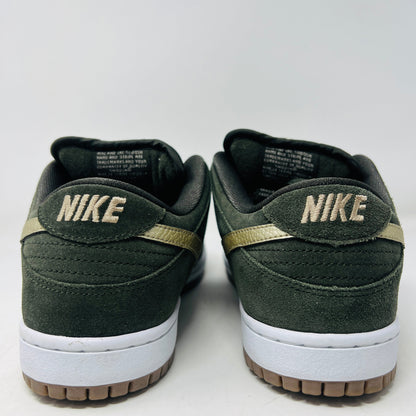 A pair of super clean, 100% authentic Nike SB Dunk Low Sequoia White Gum sneakers is seen from the back, featuring gold Nike logos on the heel and a white midsole against a plain white background.