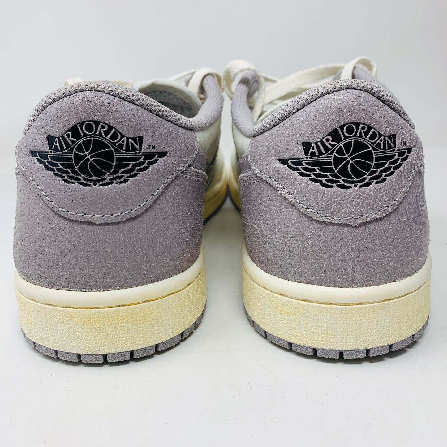 Jordan 1 Retro Low OG Atmosphere Grey sneakers, size 11, super clean condition, rear view.