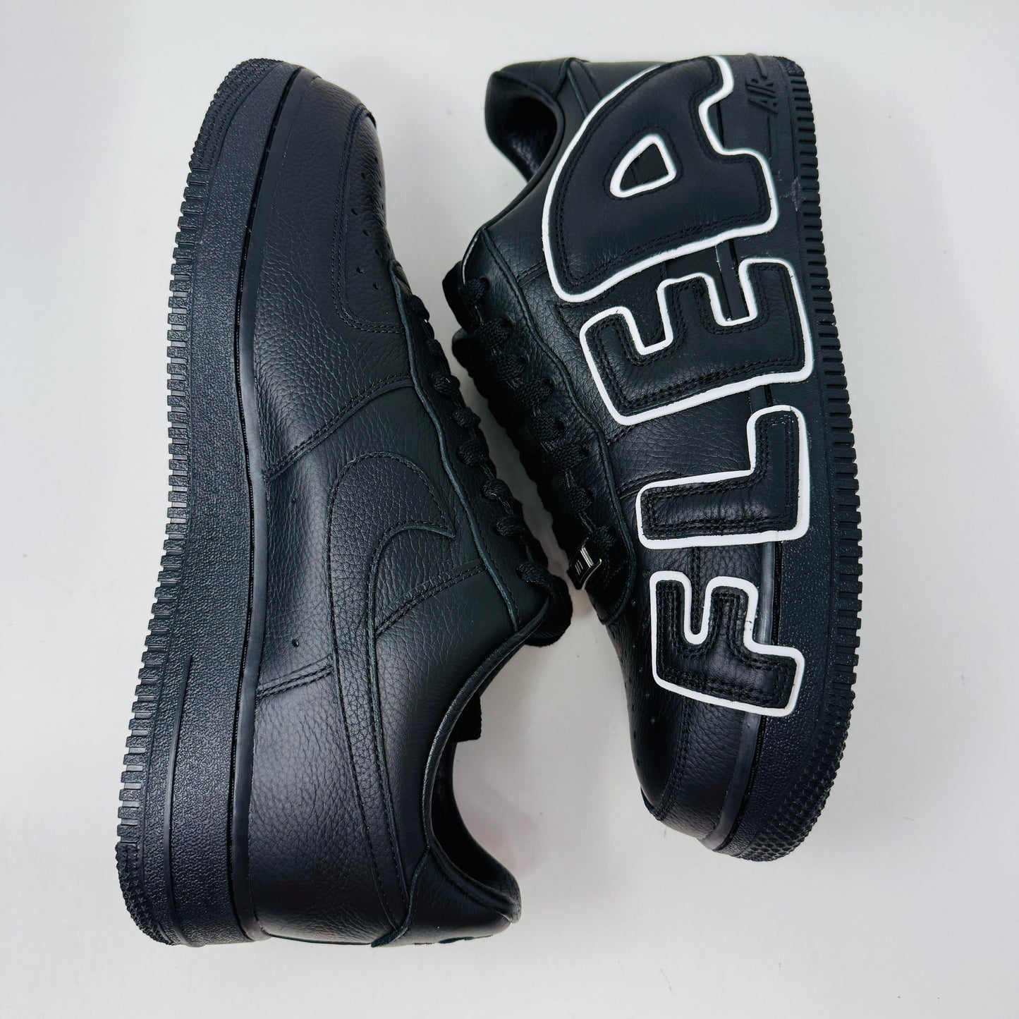 Nike Air Force 1 Low Cactus Plant Flea Market Black 2024 sneaker with unique cactus graphic and iconic swoosh logo.