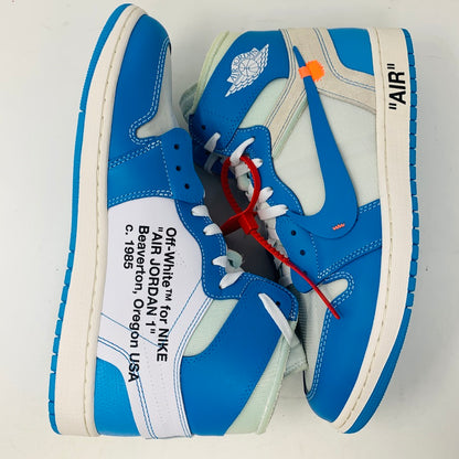 The Jordan 1 Retro High Off-White University Blue sneakers feature a white and blue design with text print on the side and orange zip ties.